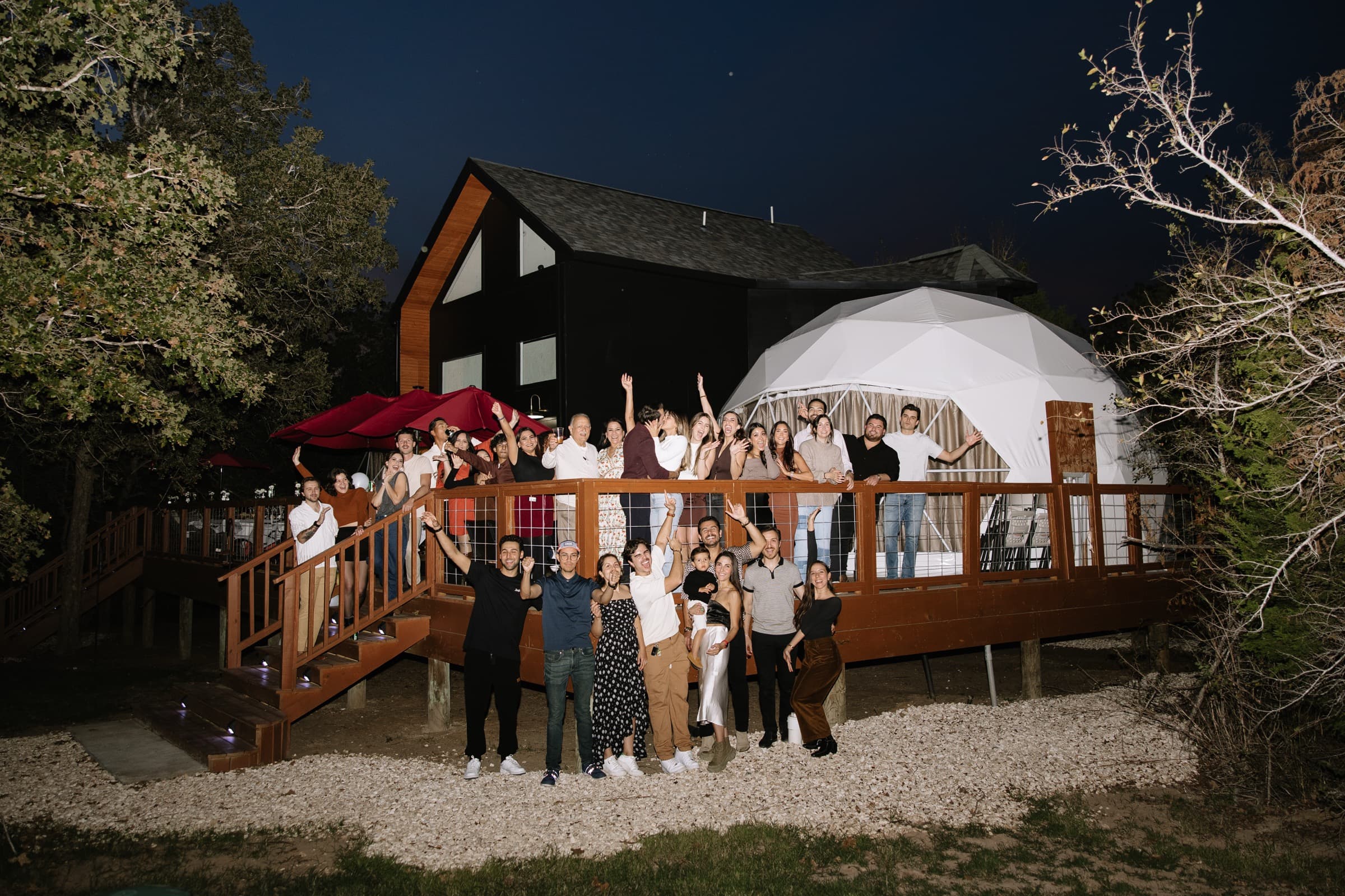 Group gathered outside a Zenfulcove dome for a private event